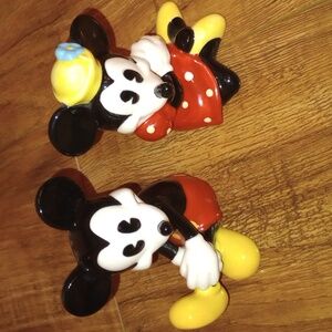 Mickey and Minnie glass figurines from Disney.
